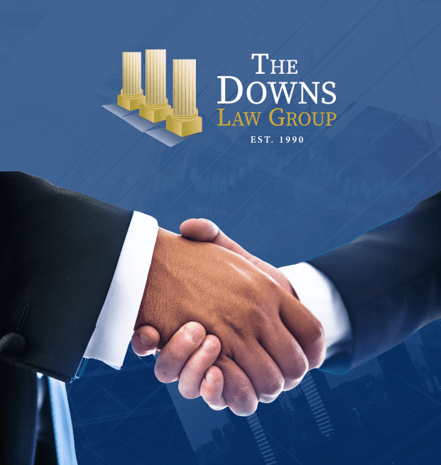 Image Of Two Business Men Shaking For Commercial Litigation Law With Logo Reading 'The Downs Law Group'