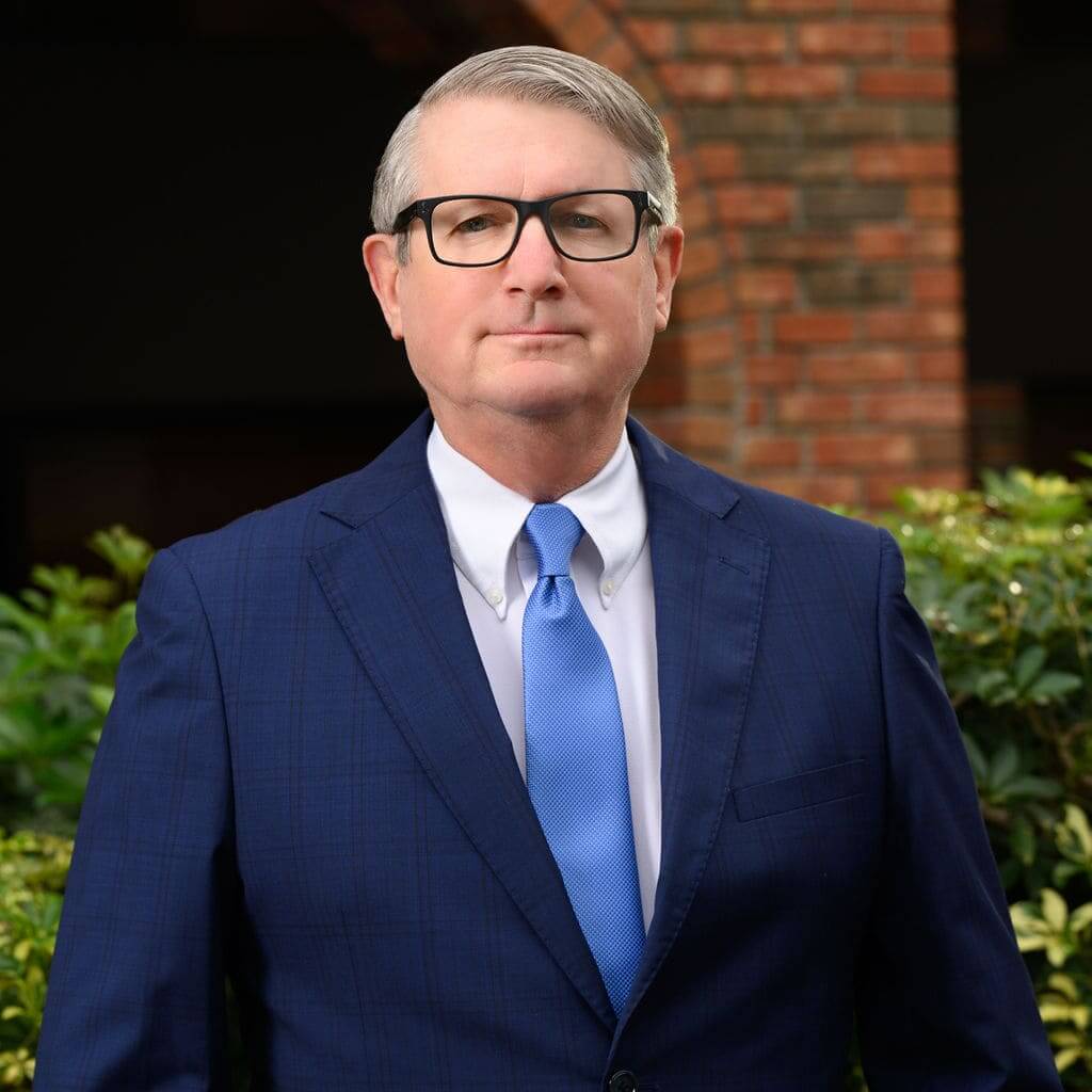 This is a headshot of attorney Craig T. Downs, founding and principal attorney at The Downs Law Group - a mass tort, class action, and personal injury law firm in Miami, Florida.