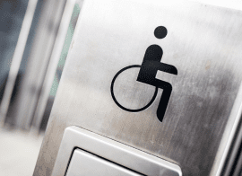 Disability Sign On Building For Non-Service Members With Wheelchair