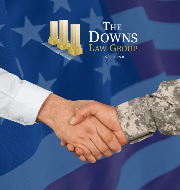 This Is An Image Of Two Hands Shaking With The American Flag Behind Them And The Logo Of The Downs Law Group, A Personal Injury Law Firm In Florida